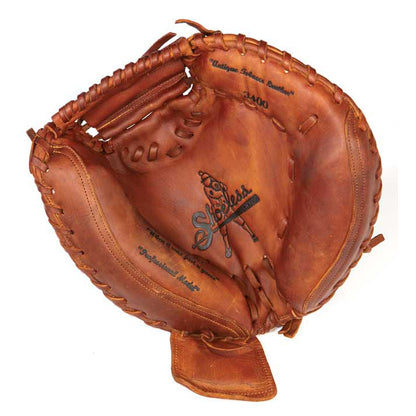 The Shoeless Joe 34" Baseball Catcher's Mitt: 3400CM features tobacco-tanned steerhide, visible stitching, and "Shoeless Joe" emblazoned on the palm—a classic mitt for catchers from the Shoeless Joe brand.