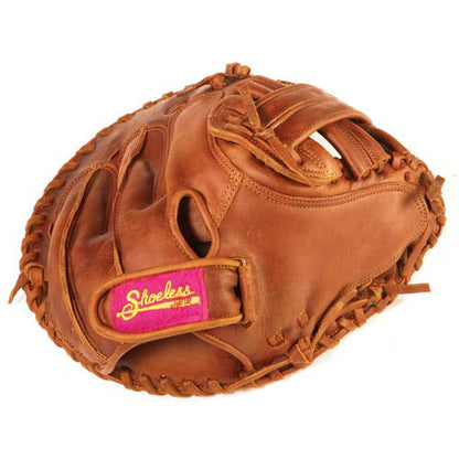 A brown leather Shoeless Joe 34" Fastpitch Catcher's Mitt (3400FPCM) features visible stitching and a red and yellow Shoeless label on the adjustable wrist strap, displayed against a white background.
