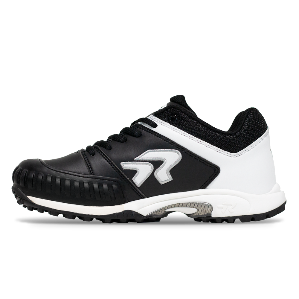 The Ringor Flite Turf PTT Women's Fastpitch Softball Shoes with Pitching Toe (4842S) by Ringor is shown in black and white with a textured sole, lace-up front, and silver logo, designed for performance and comfort on the field.