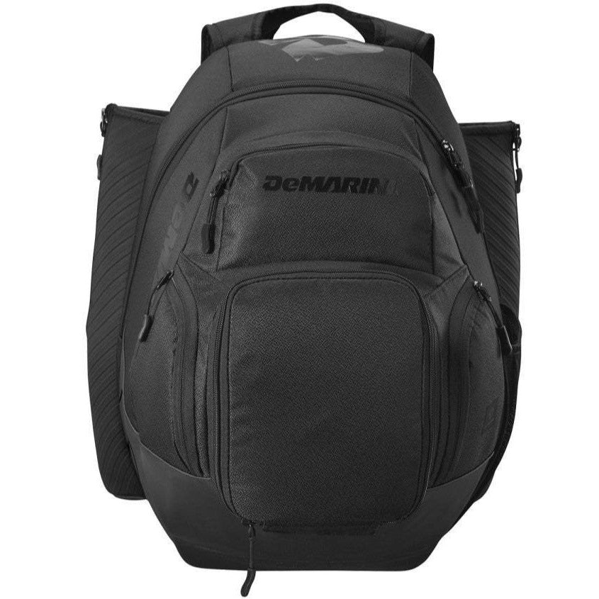 The DeMarini Voodoo OG Backpack: WB57117 is a black DeMarini baseball backpack with multiple zippered compartments and two large side pockets, ideal for carrying sports gear or using as a roomy bat bag.
