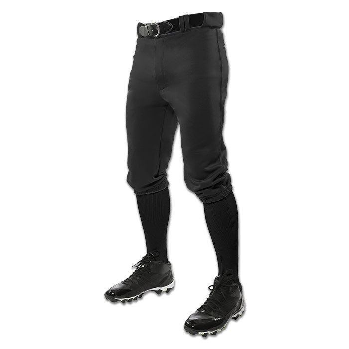A person shown from the waist down wears Champro Sports Adult Triple Crown Knicker Baseball Pants (BP10A) in black, made of pro-weight, abrasion-resistant fabric, paired with black knee-high socks, cleats, and a belt against a white background.