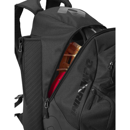 The DeMarini Voodoo OG Backpack (WB57117) is a black baseball backpack designed for carrying your gear with interior bat storage—ideal as a bat bag from the trusted brand, DeMarini.