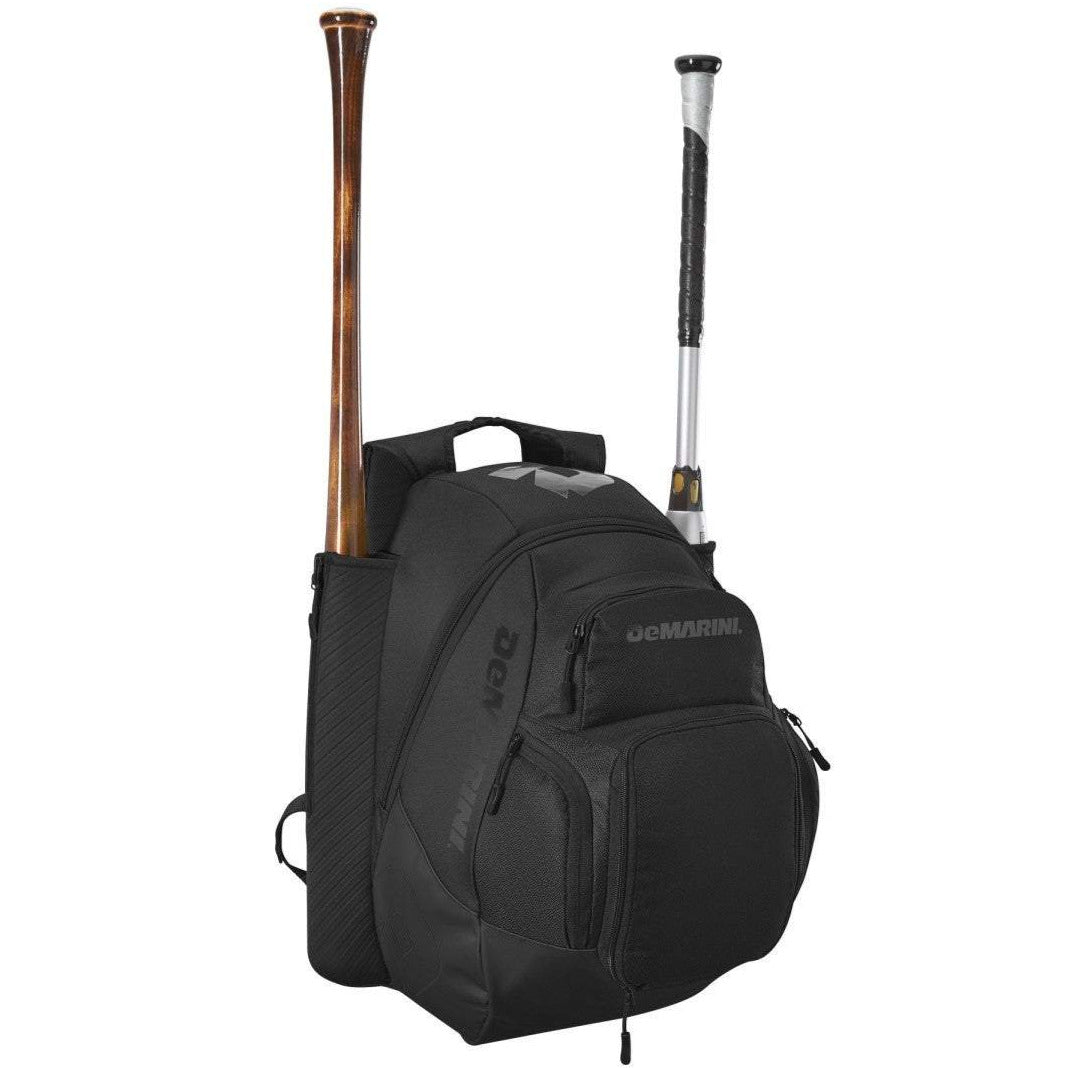 The DeMarini Voodoo OG Backpack: WB57117 by DeMarini is a black baseball backpack with two side pockets for bats and multiple zippered compartments, making it ideal for carrying wooden and metal bats plus all your gear.
