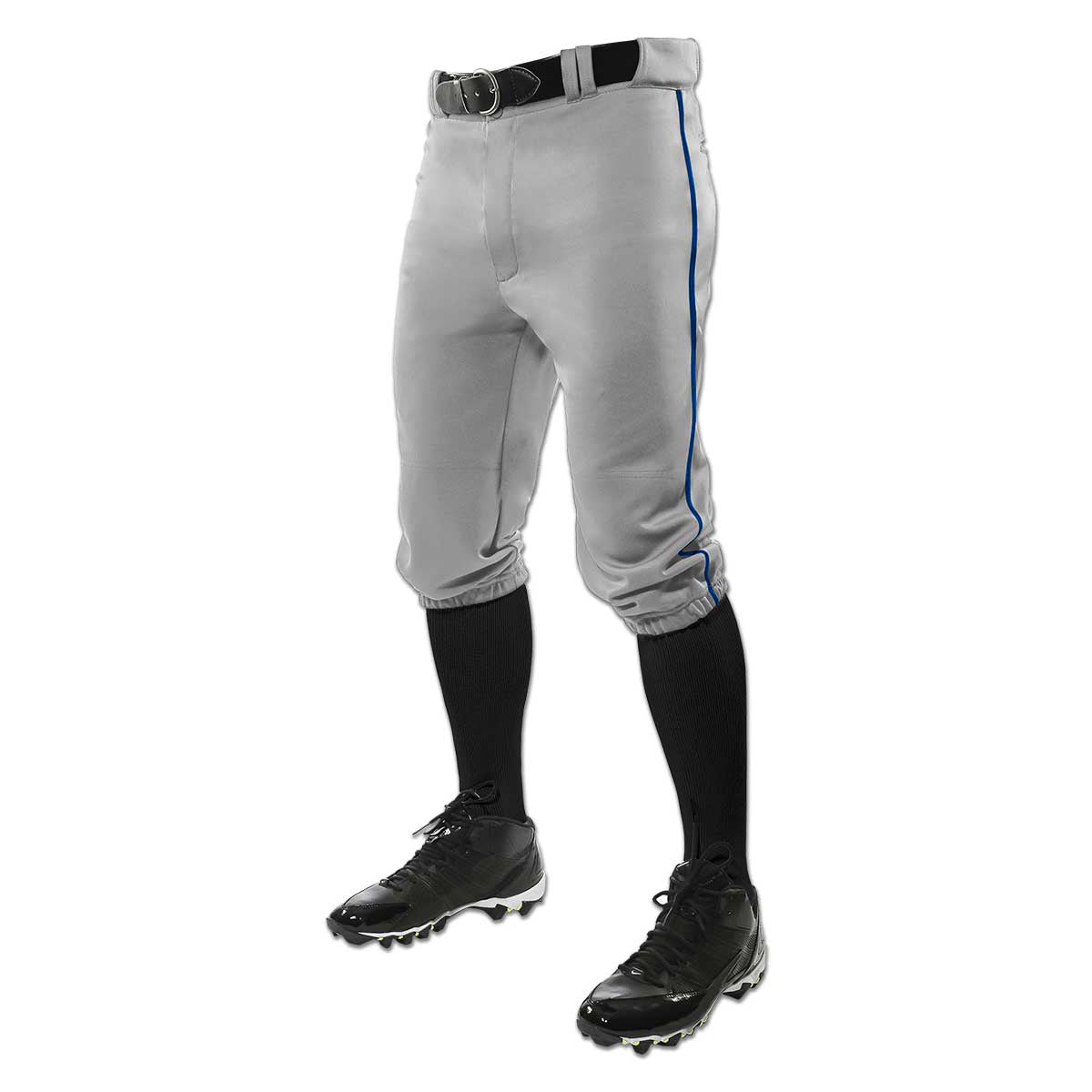 A person wears Champro Sports Youth Triple Crown Knicker Baseball Pants with blue piping (BP101Y), a black belt, black knee-high socks, and cleats—made from pro-weight fabric—shown from the waist down against a white background.