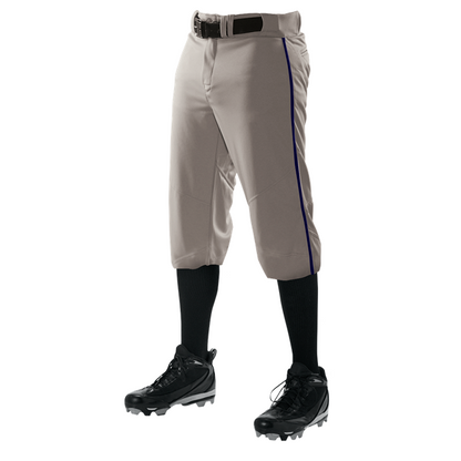 The Alleson Adult Crush Knicker Baseball Pants with Piping (655PKB) feature a durable double-knit polyester build, gray color with purple side stripe, and are shown on a mannequin paired with black belt, knee-high socks, and cleats. Brand: Alleson.