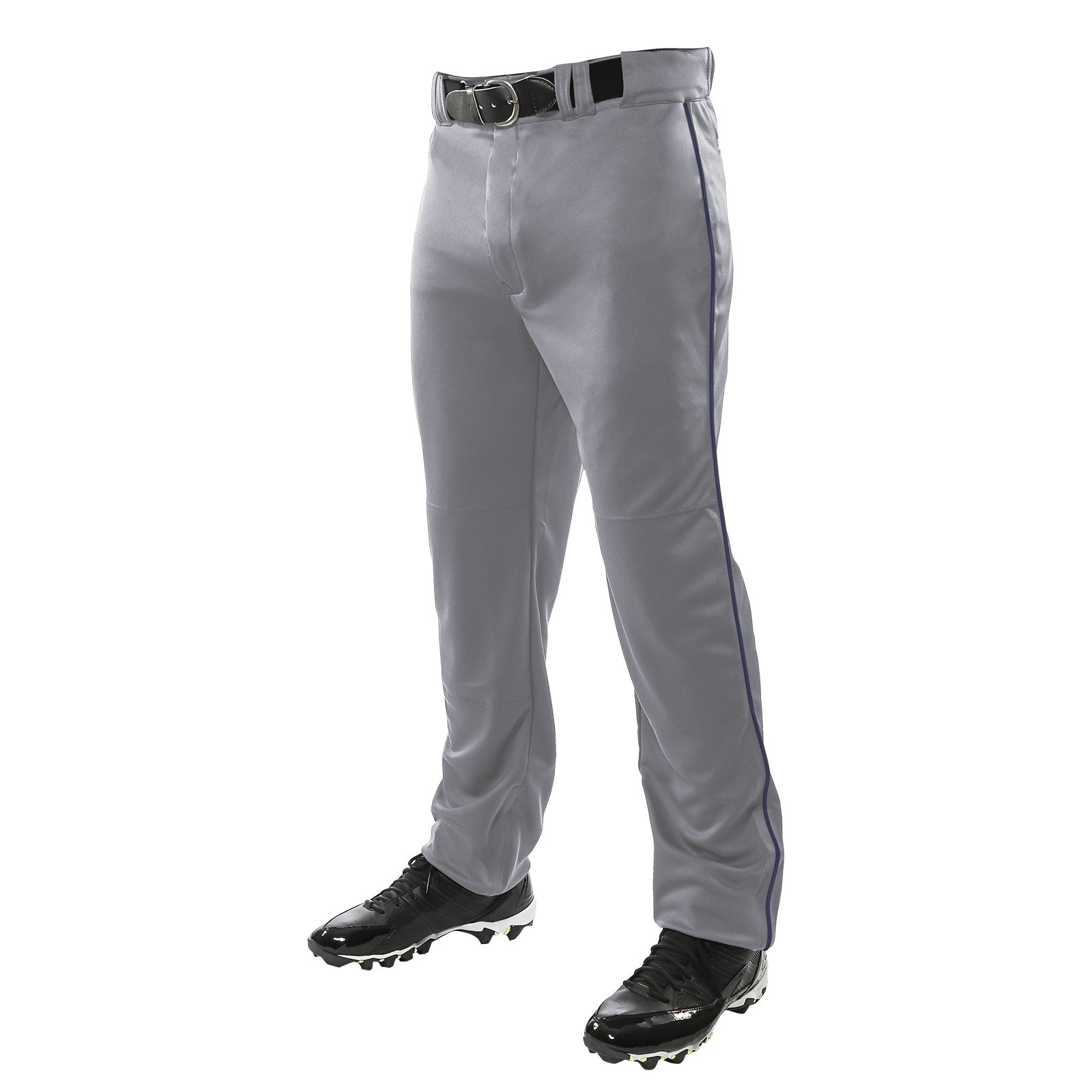 A person wearing Champro Sports Youth Triple Crown Open Bottom Baseball Pants with Piping (BP91UY), paired with a black belt and black cleats, stands against a white background.