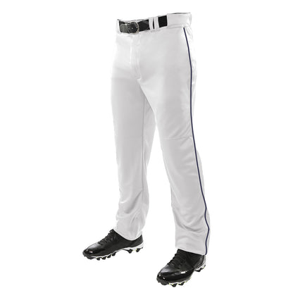 A person wearing Champro Sports Youth Triple Crown Open Bottom Baseball Pants with Piping (BP91UY), paired with a black belt and black cleats, shown from the waist down against a plain white background.