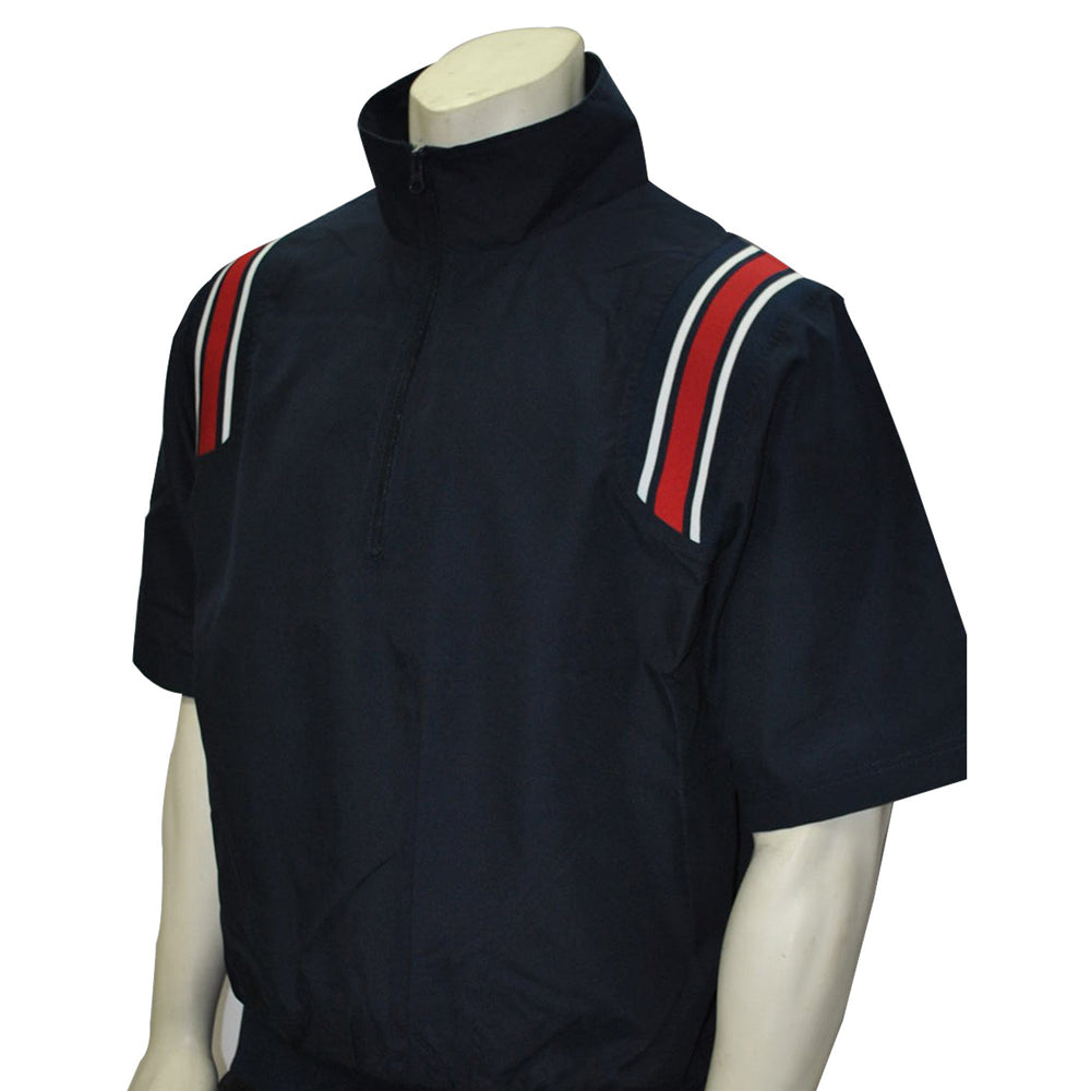 A mannequin displays the Smitty Short Sleeve Umpire Jacket (BBS-324), featuring a dark microfiber shell, half zip, and red and white shoulder stripes, set against a plain white background.