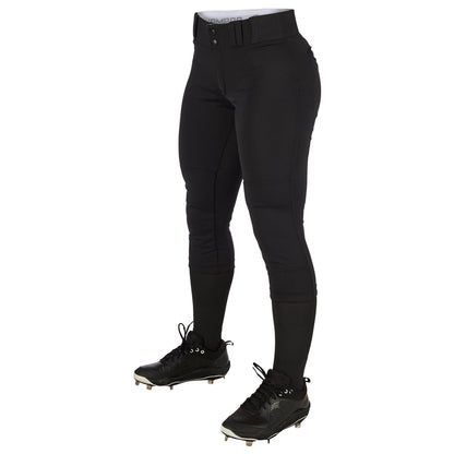 A person wearing Champro Sports Women's Low Rise Tournament Fastpitch Softball Pants (BP11W) in black, along with black socks and cleats, stands against a white background. Only the lower body is visible.
