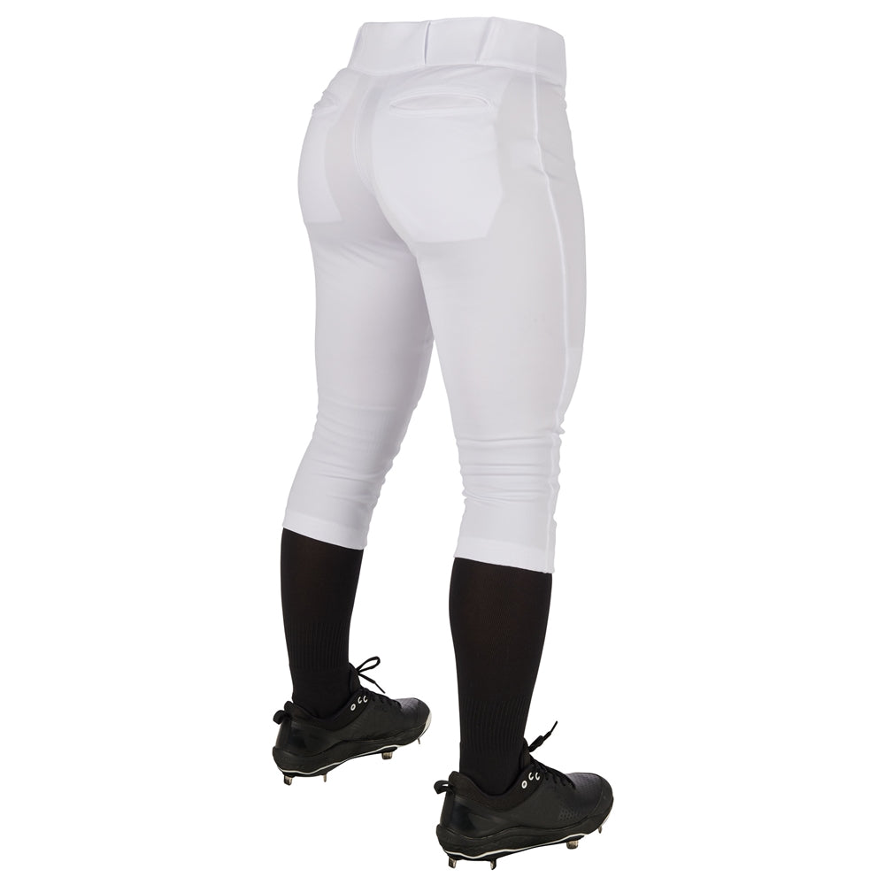 A person wearing Champro Sports Women's Low Rise Tournament Fastpitch Softball Pants (BP11W), paired with black knee-high socks and black cleats, shown from the back against a white background.