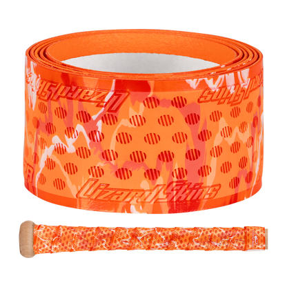 The Lizard Skins DSP Ultra Camo 1.1mm Bat Grip is an orange polymer grip tape with red dots and white streaks, wrapped on a handle. The Lizard Skins brand name appears on the grip.