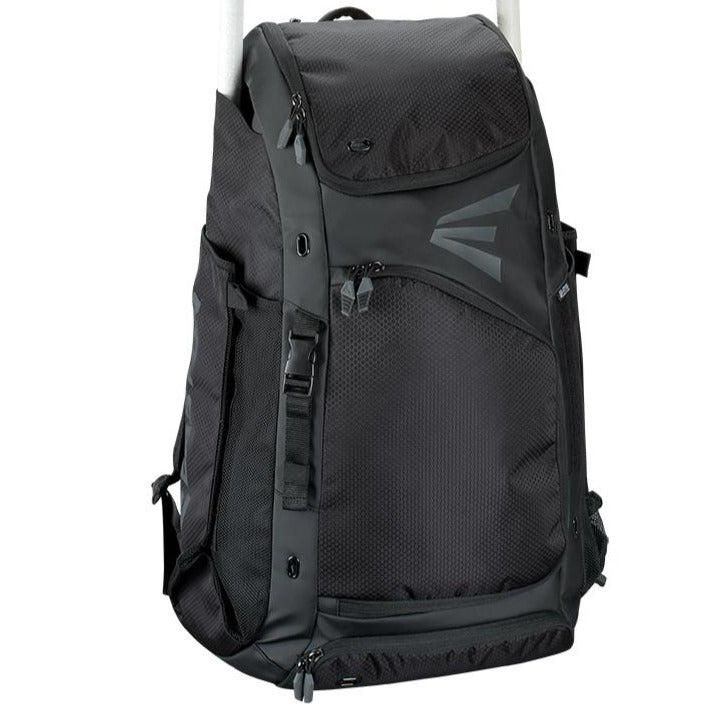 The Easton E610 Catcher's Backpack (E610CBP CATBP) by Easton is a spacious black bag with multiple zippered compartments, mesh side pockets, and an angular front design—perfect for baseball or catcher’s gear—shown upright against a white background.