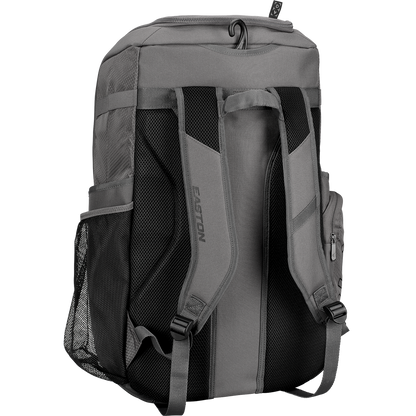 The Easton Roadhouse Backpack: EBA004 by Easton is shown from the back, featuring padded shoulder straps, mesh side pockets, and a small side zippered pocket. Its durable fabric and simple, functional design stand out.