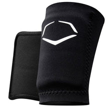 A black EvoShield Wrist Guard: A150 made of neoprene, featuring visible stitching and a white geometric logo on the front, is shown upright against a plain white background—delivering style and reliable support.