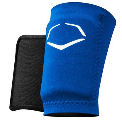 A blue fabric knee or elbow sleeve with a white angular design sits next to an EvoShield A150 black wrist guard pad, both displayed on a white background.