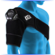 A person in blue wears the Bownet ICE20 Single Shoulder Ice Compression Wrap: ICE-Shoulder, a black shoulder wrap with a refillable round ice bag for injury recovery, covering the upper arm and shoulder.
