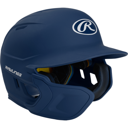 A Rawlings Mach Matte Batting Helmet with EXT Flap (MACHEXT) in dark blue, featuring the Rawlings logo in white on the front and side, plus interior padding visible from the open face area.