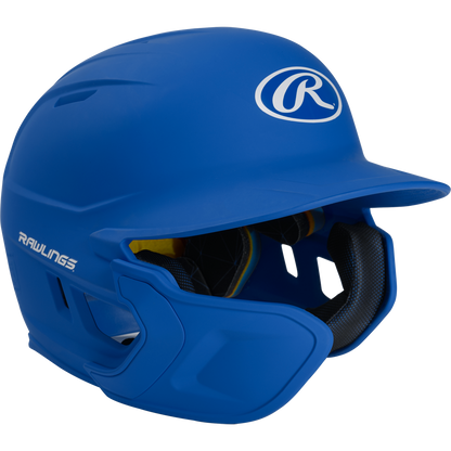 A vibrant blue Rawlings Mach Matte Batting Helmet with EXT Flap (MACHEXT) features a protective face guard, black interior padding, and the Rawlings logo on the front and side.