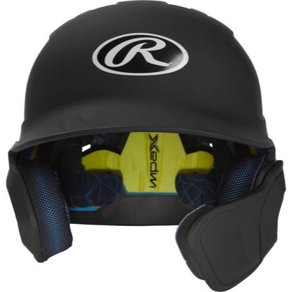 A Rawlings Mach Matte Batting Helmet with EXT Flap (MACHEXT), black with a white Rawlings logo on the front, features built-in ear protection and visible yellow and blue interior padding.