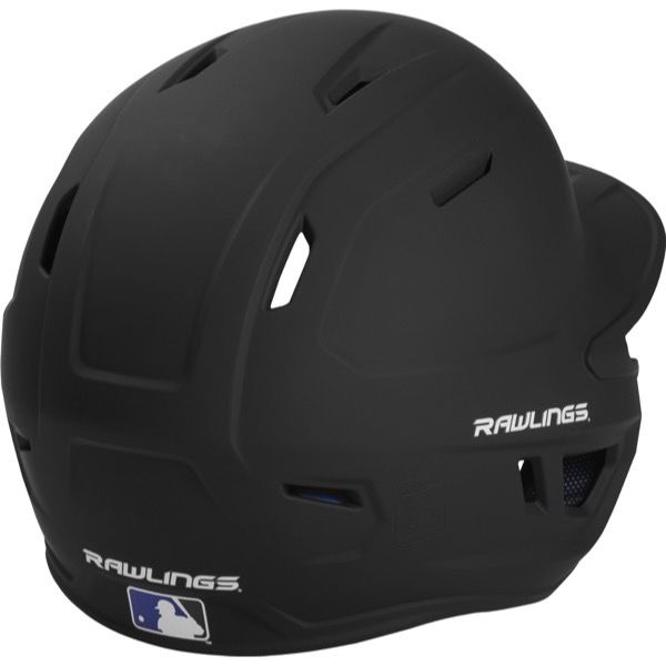 The Rawlings Mach Matte Batting Helmet with EXT Flap (MACHEXT) features ventilation holes, a matte black finish, the Rawlings name on the side and back, and the MLB logo on the rear.