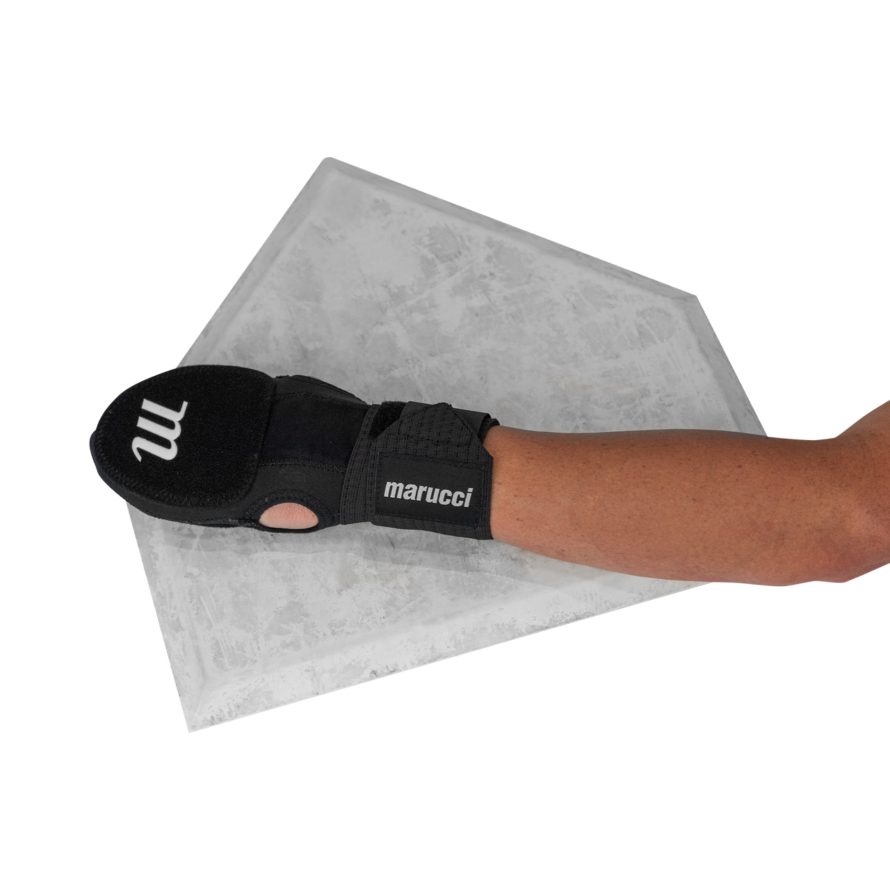 A person wearing a Marucci Sliding Mitt: MPSLDMITT rests their hand on a home plate, with only the arm visible against a white background.