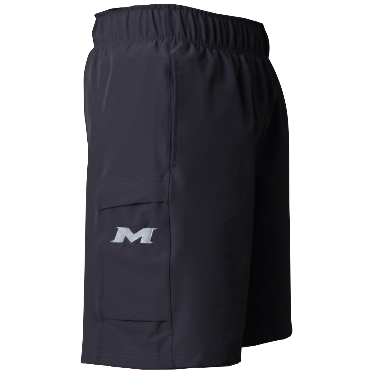 Side view of Miken Men's Slowpitch Shorts (MSPSM20) in black, featuring breathable poly-spandex, elastic waistband, and a side pocket with a white embroidered Miken 'M' logo.