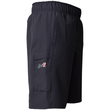 Miken Men's Slowpitch Shorts: MSPSM20 by Miken are navy blue poly-spandex athletic shorts with an elastic waistband and a side cargo pocket featuring a small embroidered American flag and stylized M logo.