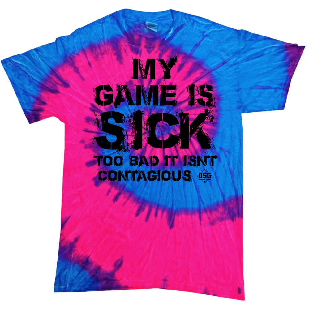 The DSG Apparel My Game Is Sick T-Shirt by DSG Apparel is a blue and pink tie dye, pre-shrunk cotton tee with "MY GAME IS SICK TOO BAD IT ISN’T CONTAGIOUS" in black on the front.