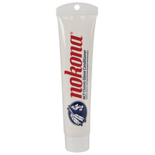 A white tube of Nokona Classic Glove Conditioner: NLT by Nokona, featuring red text and a blue Native American profile logo, with a white cap and a hanging hole at the top, designed for glove preservation.