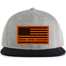 The Pacific Headwear NSA Leather Patch Wool Blend Heather Snapback Hat (P750-LTHRBK) is gray with a black brim and features an orange and black leather patch flag logo reading National Softball Association on the front.
