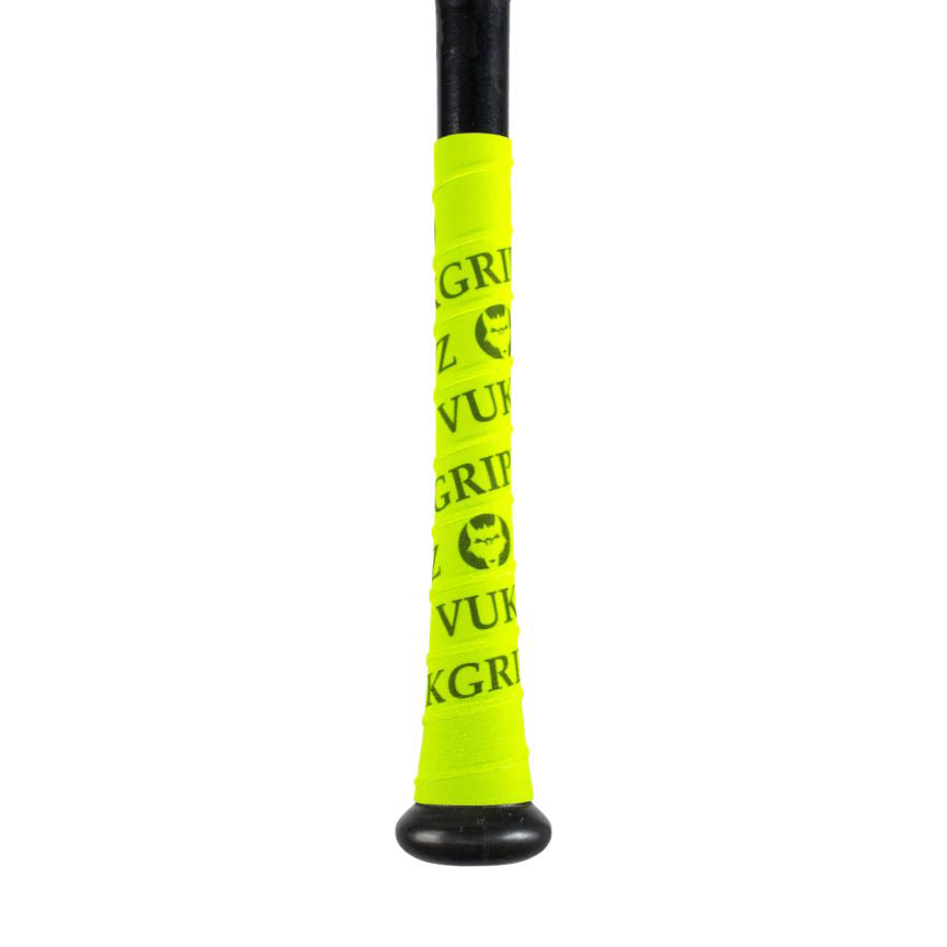 Close-up of a VukGripz Bat Grip Tape handle, featuring bright yellow tape with black VukGripz logos and text for optimum grip.