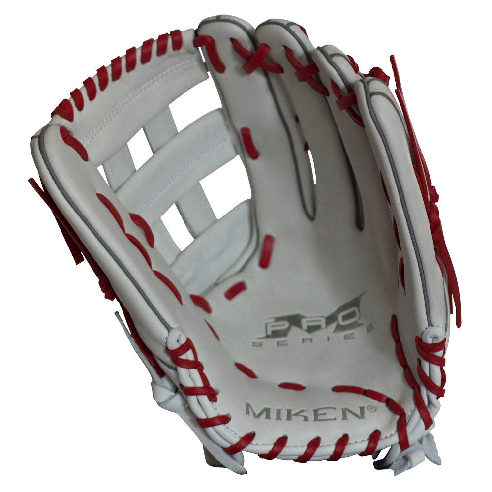 The Miken Pro Series 13.5" Slowpitch Glove (PRO135-WS) is a white glove with red laces, featuring the Miken logo and "Pro Series" text on the palm, open webbing, detailed stitching, and durable full-grain leather construction.