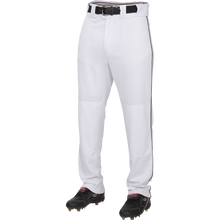 A person wears Rawlings Youth Premium Semi-Relaxed Baseball Pants with black piping (YPRO150P), a black belt, and black cleats, shown from the waist down against a plain white background.