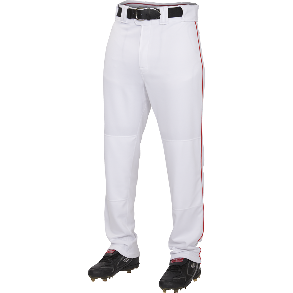 A person wears Rawlings Adult Premium Semi-Relaxed Baseball Pants with Piping (PRO150P), made of 100% polyester with a thin red stripe, paired with a black belt and black cleats, standing against a plain white background.