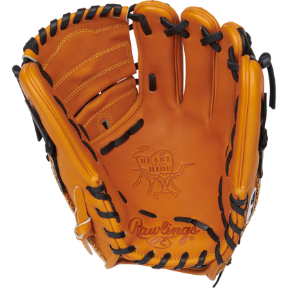 The Rawlings Heart of the Hide 11.75" Baseball Glove (PRO205-9TB) is a tan glove with black lacing and detailed stitching. Featuring open infield/pitcher's design, it displays Rawlings branding and a "Heart of the Hide" stamp on the palm.