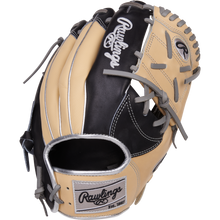 The Rawlings Heart of the Hide 11.5" Baseball Glove (PRONP4-8BCSS) features a beige and black design with gray laces, Rawlings logos on the wrist strap and back, and is crafted from premium HOH steer-hide leather.