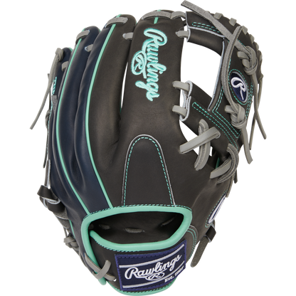 The Rawlings Heart of the Hide R2G 11.5" Baseball Glove (PROR204U-2DS) features a black design with teal and gray accents, white stitching, and a light blue and white embroidered Rawlings logo on the back.