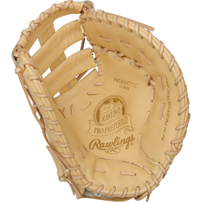 A Rawlings Pro Preferred 13" Baseball First Base Mitt (PROSDCTCC) is shown from above with the pocket open, highlighting its tan kip leather, visible stitching, laces, and palm branding—a premium choice for serious players.
