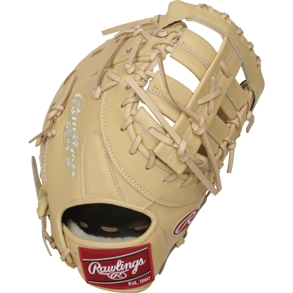 The Rawlings Pro Preferred 13" First Base Mitt (PROSDCTCC) features premium tan kip leather, tan laces, white stitching, and a red and white Rawlings logo patch near the wrist.