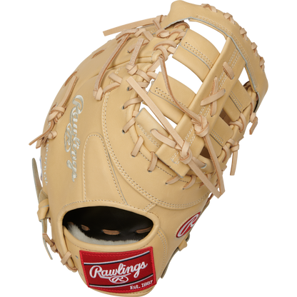 The Rawlings Pro Preferred 13" First Base Mitt (PROSDCTCC) features premium tan kip leather, tan laces, white stitching, and a red and white Rawlings logo patch near the wrist.