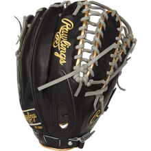 The Rawlings Pro Preferred 12.75" Mike Trout Gameday Glove (PROSMT27B) features black leather with tan and grey laces, gold embroidered logos, and detailed stitching—ideal as an outfield glove, shown upright on a white background.