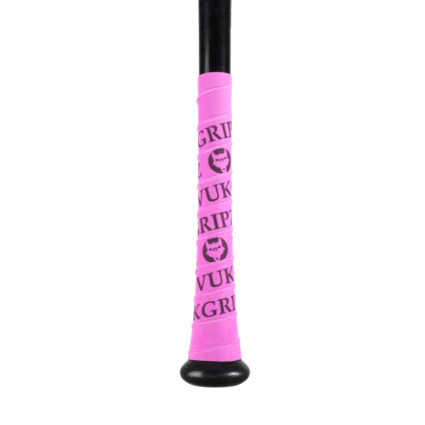 Close-up of a VukGripz Bat Grip Tape by VukGripz, featuring bright pink color with black text and a stylized face logo printed repeatedly, designed to offer optimum grip and support confident swings.