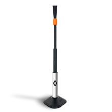 A black and silver grill cleaning brush with a long handle, orange accent, and rectangular base stands upright on a white background—its sturdy design recalls the durability of the Bownet ProMag Batting Tee by Bownet.