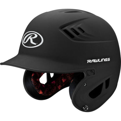 The Rawlings Velo Matte Batting Helmet: R16M is black with a protective face flap, side vents, and red interior padding. The Rawlings logo appears on the front and the brand name on the side—perfect as a youth baseball helmet.