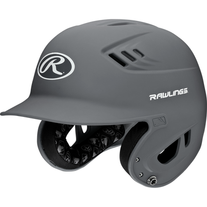 The Rawlings Velo Matte Batting Helmet: R16M offers youth players ear protection, ventilation holes, and a matte gray finish with white Rawlings logos—a stylish and safe choice for the baseball field.