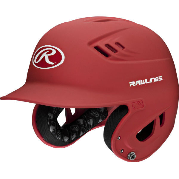 The Rawlings Velo Matte Batting Helmet: R16M is a red youth baseball helmet with a face guard, ventilation holes, visible interior padding, and the Rawlings logo on the front and side.
