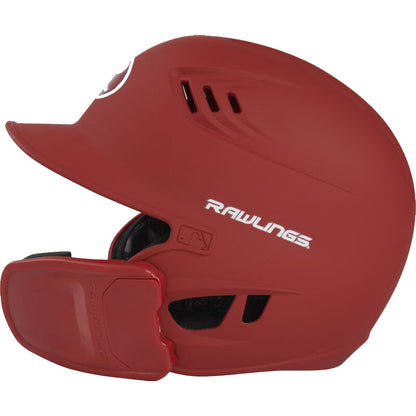 The Rawlings R16 Matte Batting Helmet with Universal Jaw Guard (R6R07) is a red helmet featuring ventilation holes, the Rawlings logo, MLB logo on the side, and includes a protective jaw guard extension for added safety.