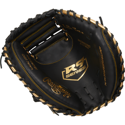 The Rawlings R9 32.5" Baseball Catcher's Mitt (R9CM325BG) is a black youth glove with tan lacing and gold accents, shown against a white background.