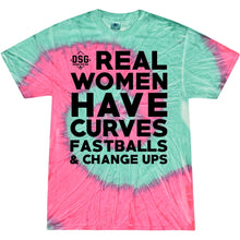 The DSG Apparel Real Women Tie Dye T-Shirt (TD-REALW) features pre-shrunk cotton in pink and green, bold black “REAL WOMEN HAVE CURVES, FASTBALLS & CHANGE UPS” text, a small DSG logo above REAL, and a comfy double-needle hem.