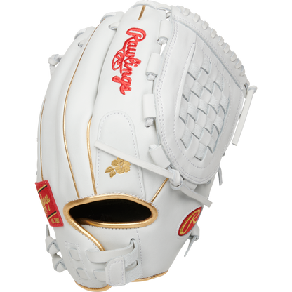 The Rawlings Liberty Advanced 12.5" Fastpitch Glove (RLA125KRG) is a white softball glove with gold accents, red Rawlings logos, woven web design, and detailed stitching.